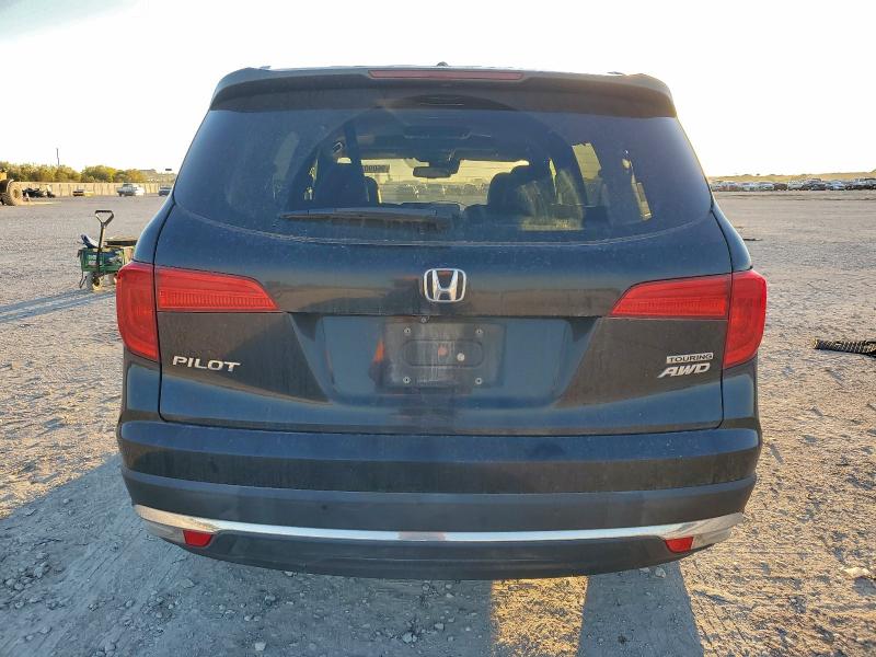Photo 6 from auction – 2017 HONDA PILOT TOUR with VIN 5FNYF6H9XHB085885