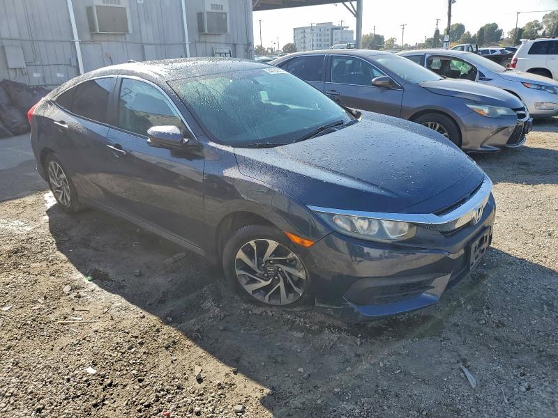 Photo 4 from auction – 2017 HONDA CIVIC EX with VIN 19XFC2F77HE213922
