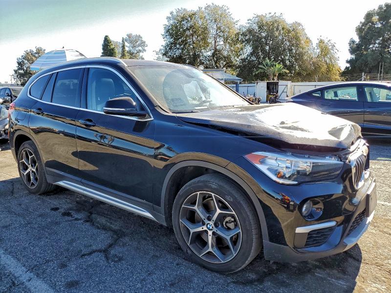Photo 4 from auction – 2018 BMW X1 with VIN WBXHT3C34J5L33178