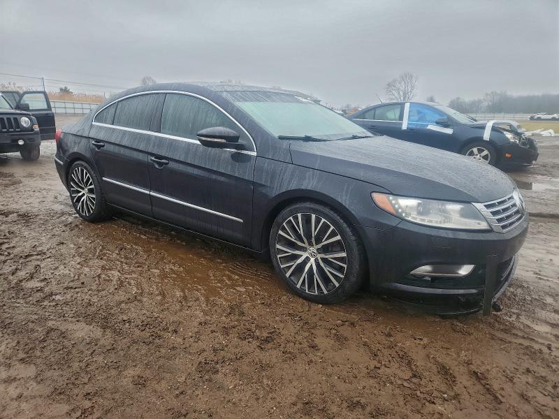 Photo 4 from auction – 2014 VOLKSWAGEN CC VR6 4MO with VIN WVWGU7AN8EE528787