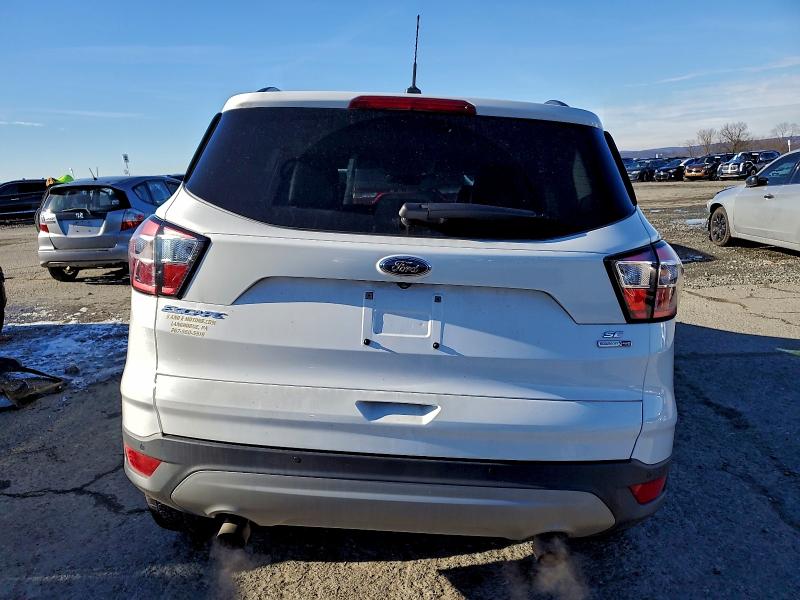 Photo 6 from auction – 2017 FORD ESCAPE with VIN 1FMCU9GD0HUD99300