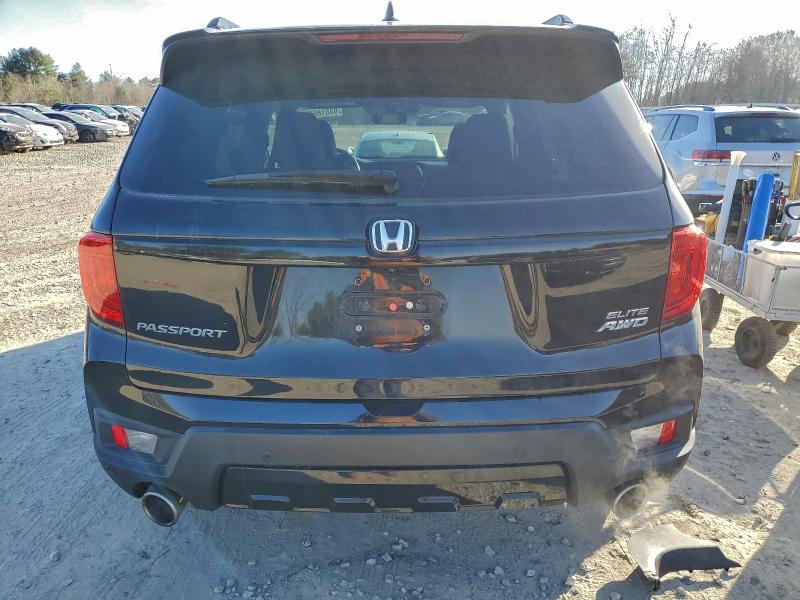 Photo 6 from auction – 2022 HONDA PASSPORT E with VIN 5FNYF8H0XNB014873