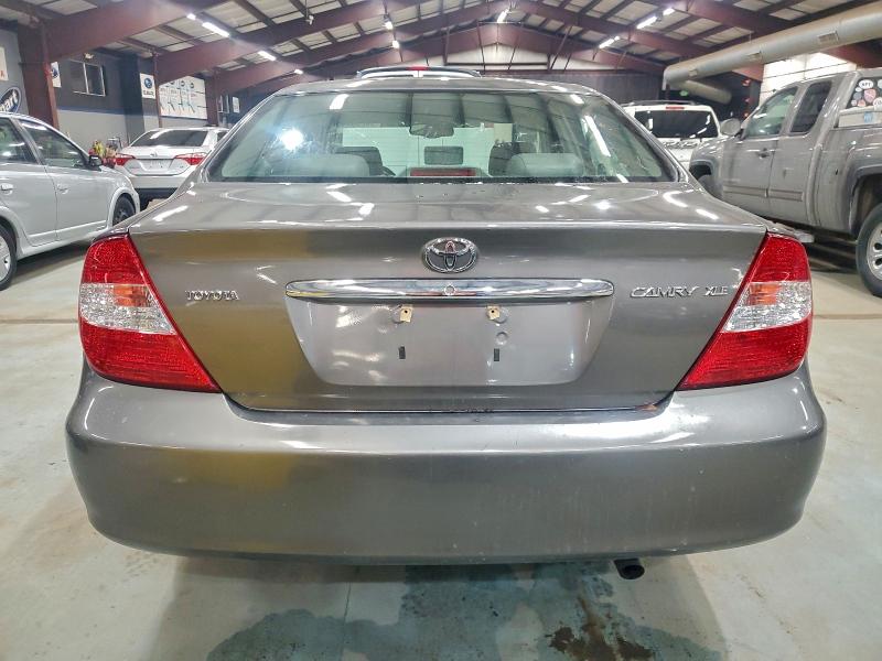 Photo 6 from auction – 2004 TOYOTA CAMRY LE with VIN 4T1BE30K74U827405