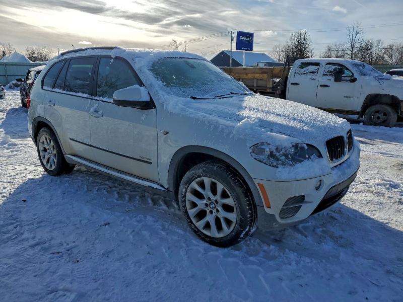 Photo 4 from auction – 2013 BMW X5 with VIN 5UXZV4C58D0B01110