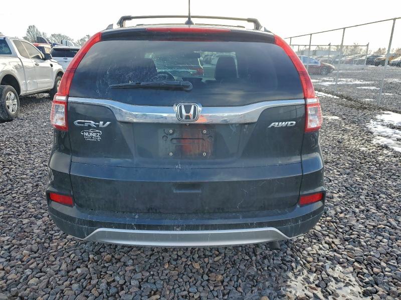 Photo 6 from auction – 2015 HONDA CR-V EXL with VIN 5J6RM4H7XFL020665