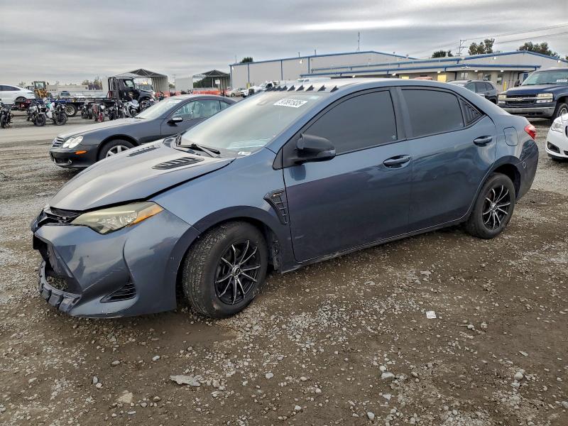 TOYOTA COROLLA L 2017 with VIN 2T1BURHE8HC932062 - Photo from auction