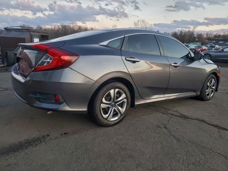 Photo 3 from auction – 2017 HONDA CIVIC LX with VIN 19XFC2F58HE203351