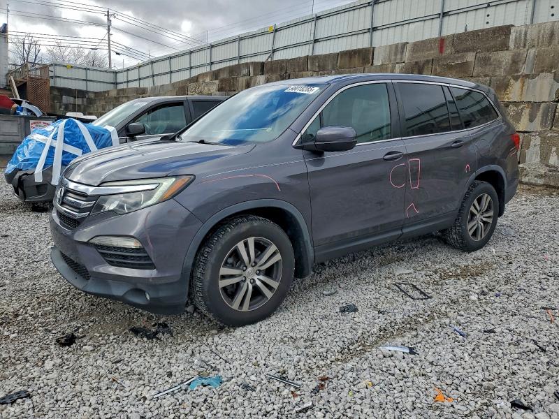 HONDA PILOT EXL 2017 with VIN 5FNYF6H51HB073699 - Photo from auction
