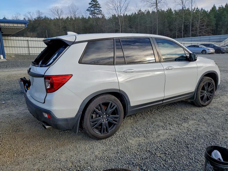 Photo 3 from auction – 2021 HONDA PASSPORT E with VIN 5FNYF7H58MB006744