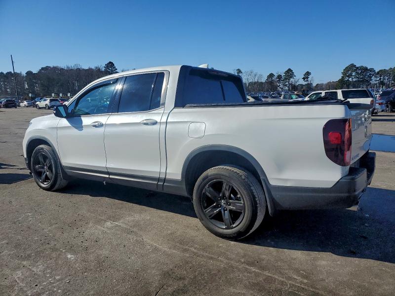 Photo 2 from auction – 2021 HONDA RIDGELINE with VIN 5FPYK3F82MB006733