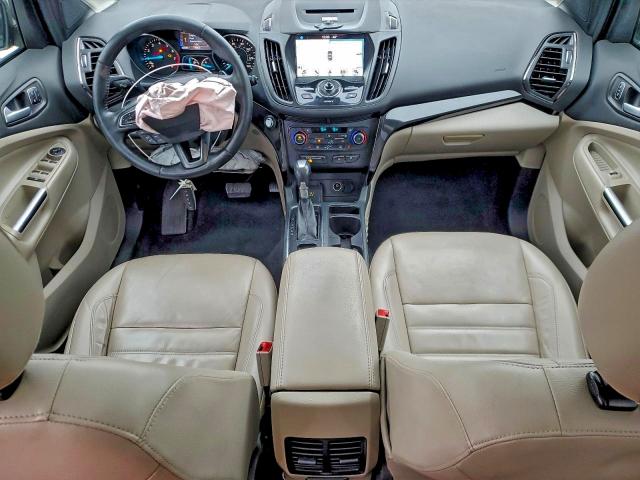Photo 8 from auction – 2017 FORD ESCAPE TIT with VIN 1FMCU0J94HUB73566