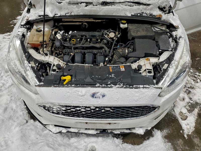 Photo 11 from auction – 2018 FORD FOCUS SE with VIN 1FADP3K24JL230370