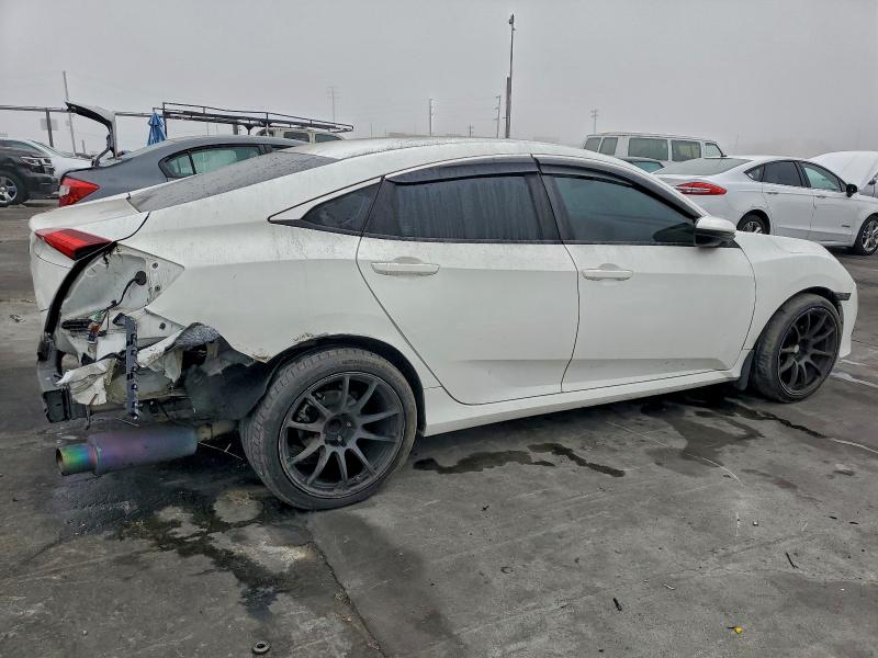Photo 3 from auction – 2016 HONDA CIVIC LX with VIN 2HGFC2F53GH567956