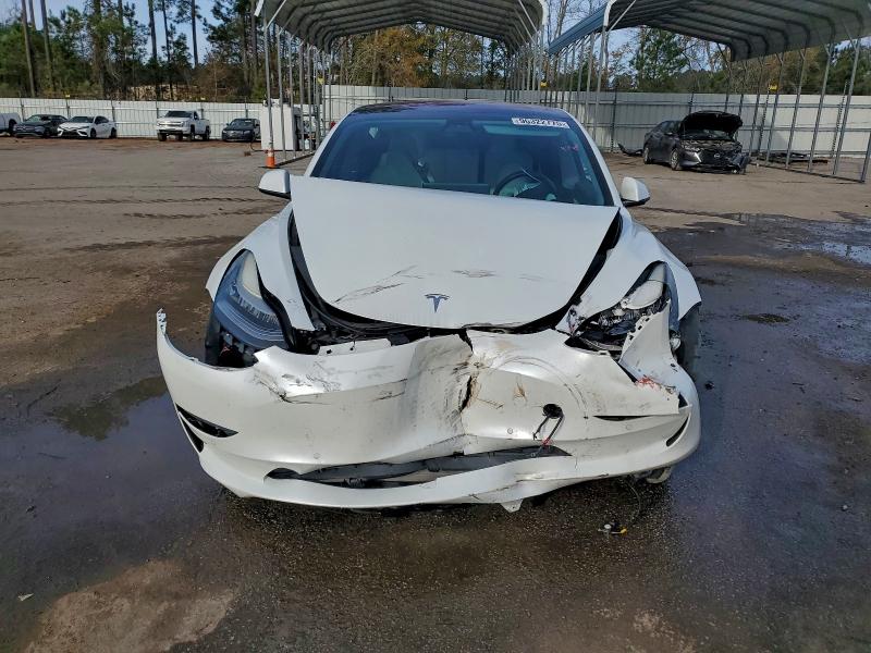 Снимка 5 от търг – 2018 TESLA MODEL 3 с VIN 5YJ3E1EA8JF168686