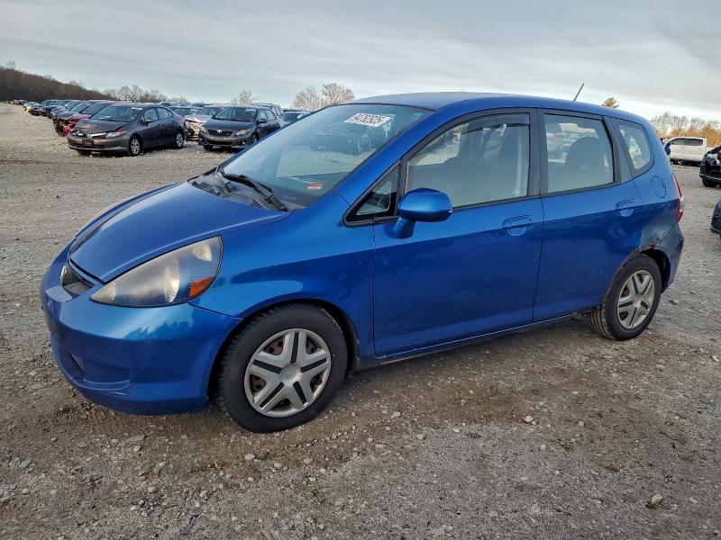 HONDA FIT 2007 with VIN JHMGD38477S023784 - Photo from auction