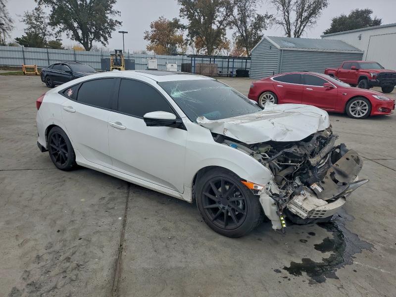 Photo 4 from auction – 2017 HONDA CIVIC EXL with VIN 2HGFC1F71HH644000