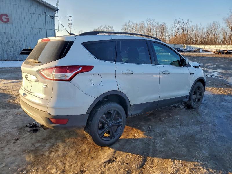 Photo 3 from auction – 2016 FORD ESCAPE with VIN 1FMCU9GX6GUC32206
