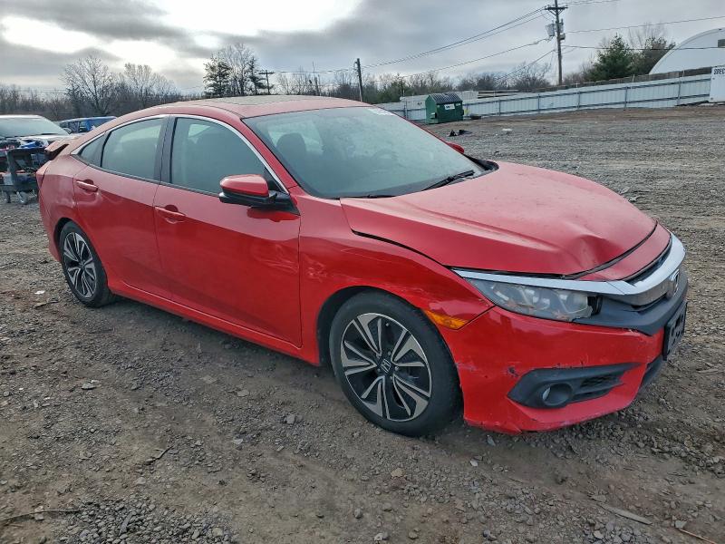 Photo 4 from auction – 2017 HONDA CIVIC with VIN 2HGFC1F34HH640424