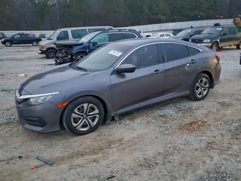 HONDA CIVIC LX 2017 with VIN 19XFC2F58HE052124 - Photo from auction