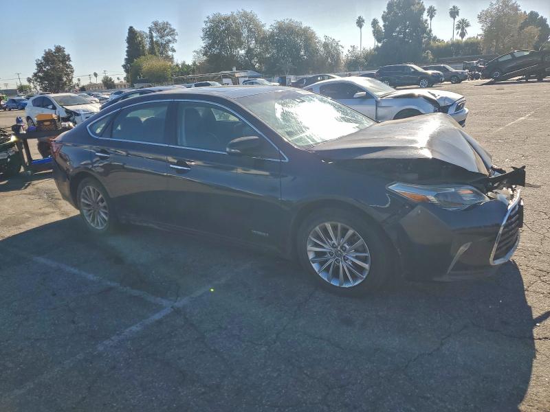 Photo 4 from auction – 2016 TOYOTA AVALON HYB with VIN 4T1BD1EB9GU049967