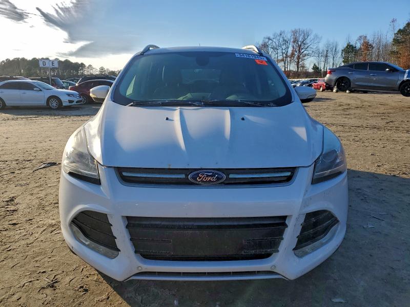 Photo 5 from auction – 2015 FORD ESCAPE TIT with VIN 1FMCU9J92FUA34828