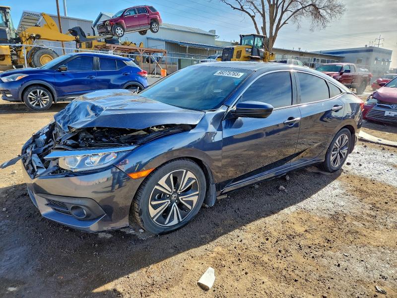Photo 1 from auction – 2018 HONDA CIVIC EX with VIN JHMFC1F36JX016574