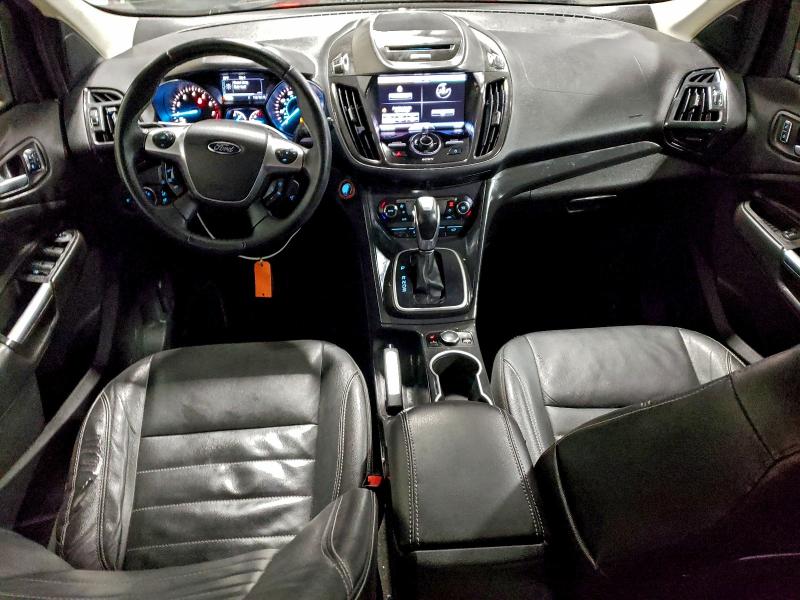 Photo 8 from auction – 2014 FORD ESCAPE TIT with VIN 1FMCU9JXXEUB63526
