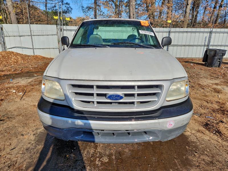 Photo 5 from auction – 1999 FORD F150 with VIN 1FTRX18W0XNA26256