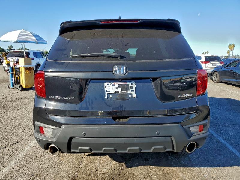 Photo 6 from auction – 2023 HONDA PASSPORT with VIN 5FNYF8H54PB030484