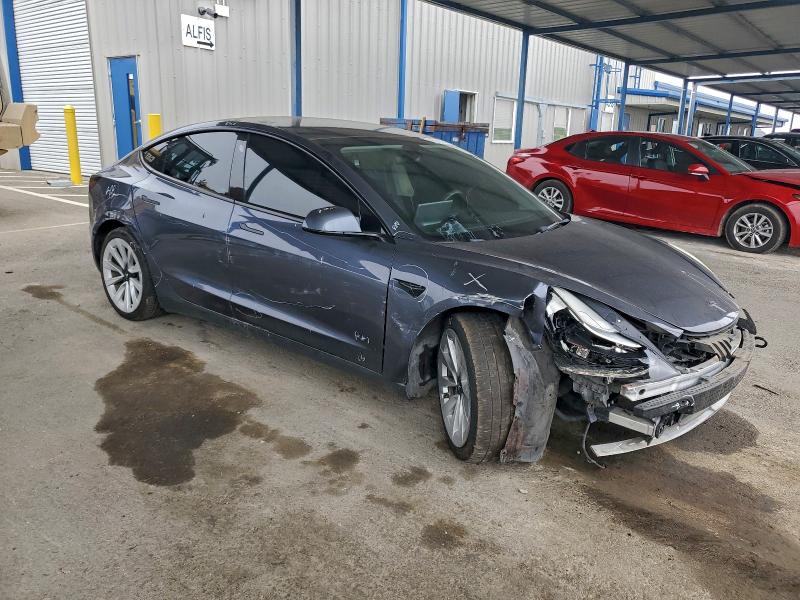 Photo 4 from auction – 2022 TESLA MODEL 3 with VIN 5YJ3E1EAXNF142712
