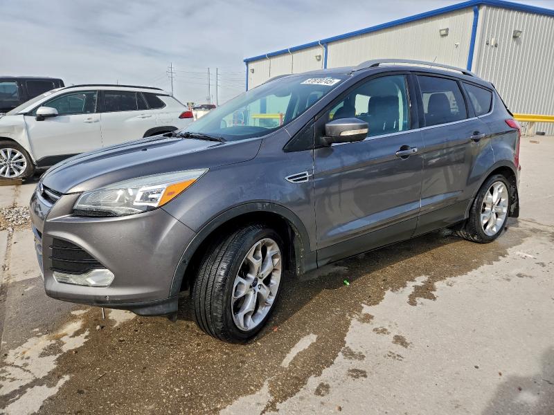FORD ESCAPE TIT 2014 with VIN 1FMCU0J97EUB27144 - Photo from auction