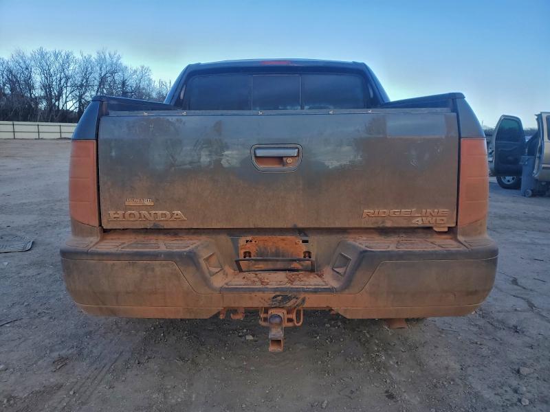 Photo 6 from auction – 2011 HONDA RIDGELINE with VIN 5FPYK1F51BB006696