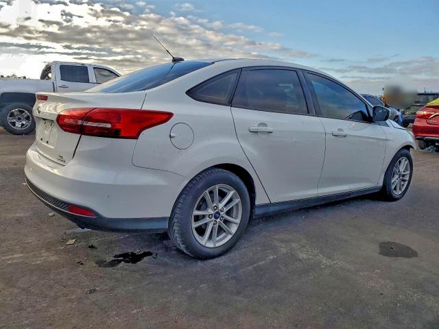 Photo 3 from auction – 2016 FORD FOCUS SE with VIN 1FADP3F21GL364630