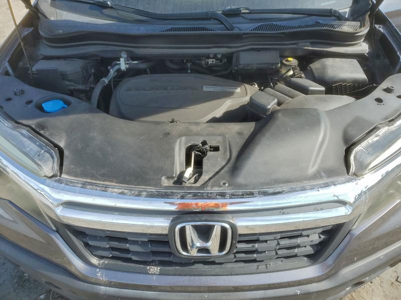 Photo 11 from auction – 2017 HONDA RIDGELINE with VIN 5FPYK3F57HB023037