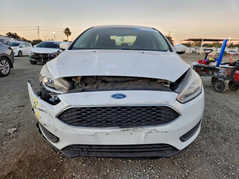 Photo 5 from auction – 2017 FORD FOCUS with VIN 1FADP3F25HL218846