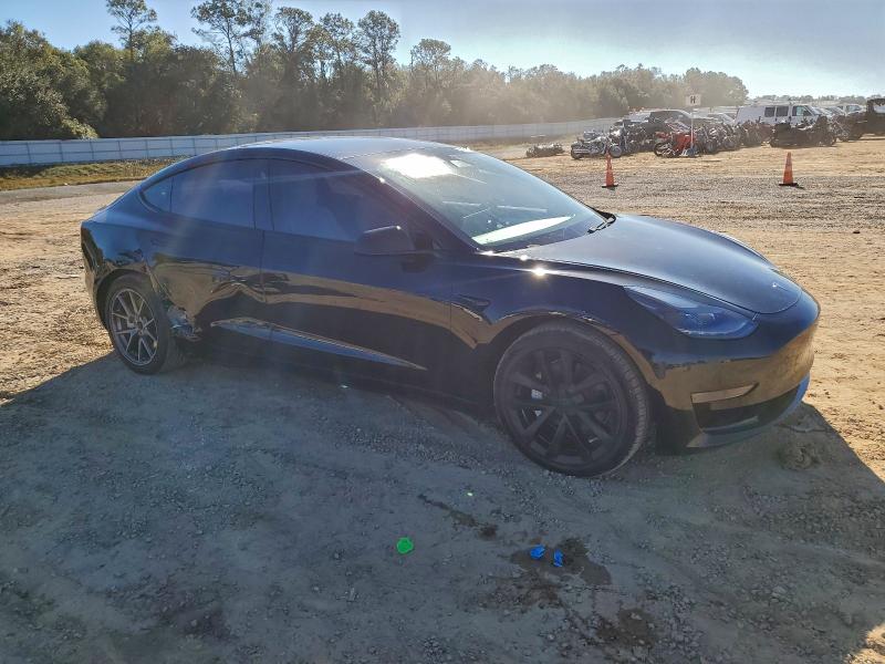 Photo 4 from auction – 2021 TESLA MODEL 3 with VIN 5YJ3E1EAXMF043712