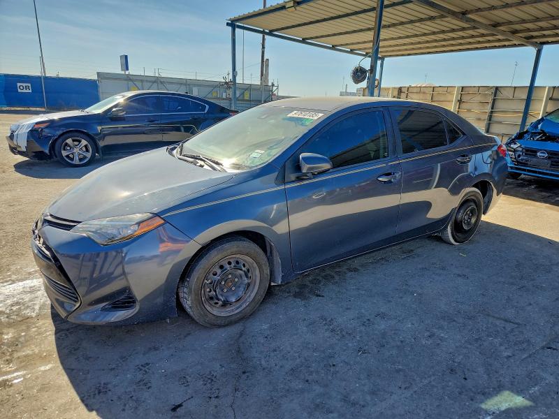 TOYOTA COROLLA L 2017 with VIN 5YFBURHE8HP595571 - Photo from auction