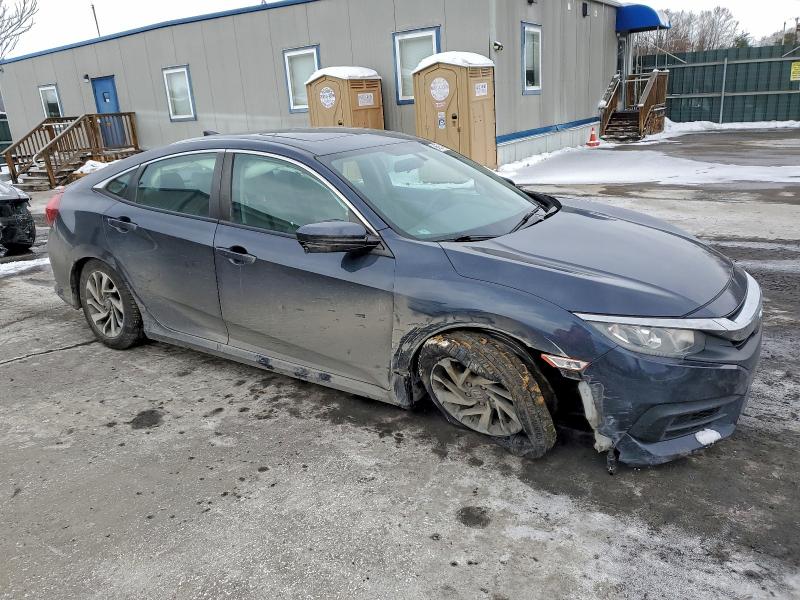 Photo 4 from auction – 2017 HONDA CIVIC EX with VIN 2HGFC2F71HH560474