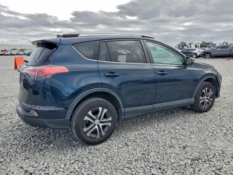 Photo 3 from auction – 2017 TOYOTA RAV4 LE with VIN JTMZFREV4HJ119447