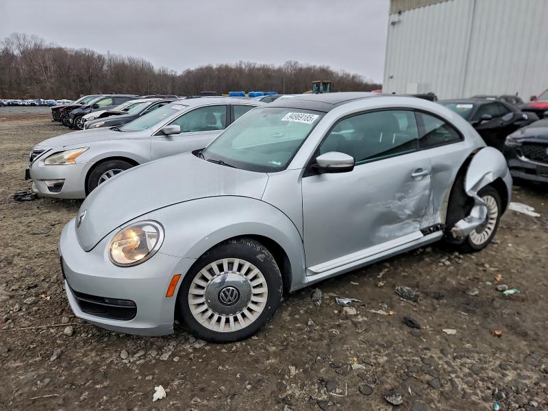 VOLKSWAGEN BEETLE 2014 with VIN 3VWJP7AT8EM605631 - Photo from auction