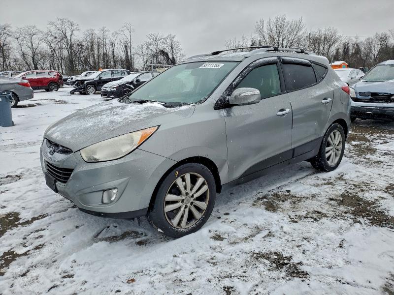 HYUNDAI TUCSON GLS 2012 with VIN KM8JUCAC3CU465240 - Photo from auction