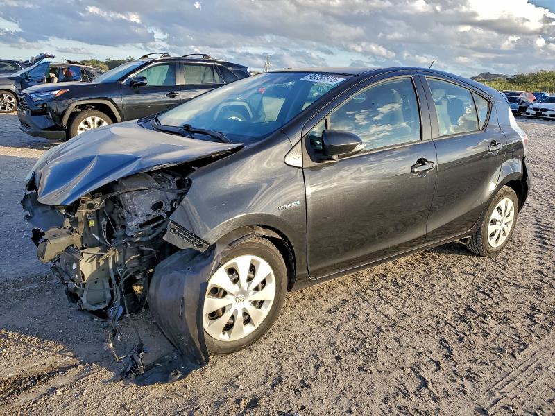 TOYOTA PRIUS C 2014 with VIN JTDKDTB32E1063866 - Photo from auction
