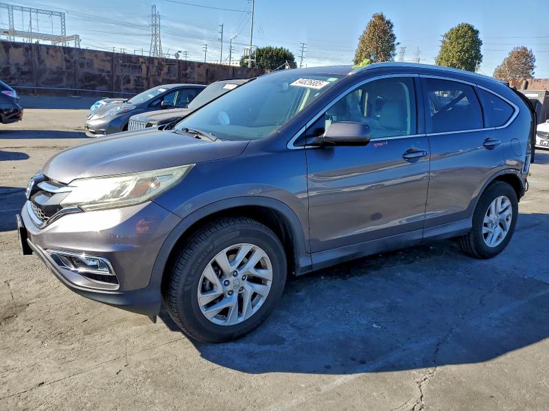 Photo 1 from auction – 2015 HONDA CR-V EXL with VIN 2HKRM3H72FH547846