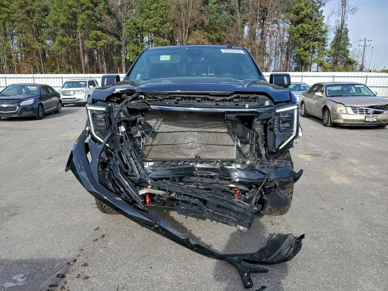 Photo 5 from auction – 2022 GMC SIERRA K15 with VIN 1GTPUEEL2NZ643973