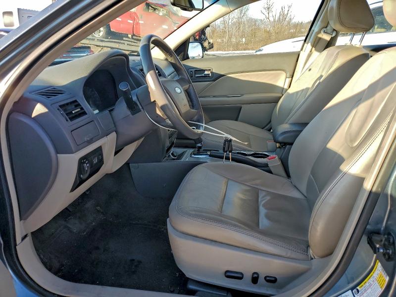 Photo 7 from auction – 2011 FORD FUSION HYB with VIN 3FADP0L37BR334053