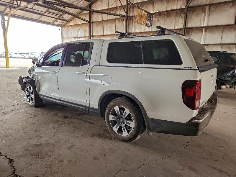 Photo 2 from auction – 2019 HONDA RIDGELINE with VIN 5FPYK2F68KB001655