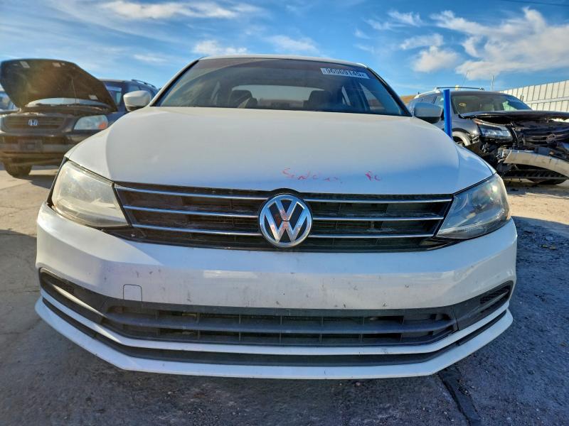 Photo 5 from auction – 2017 VOLKSWAGEN JETTA S with VIN 3VW2B7AJ1HM322073