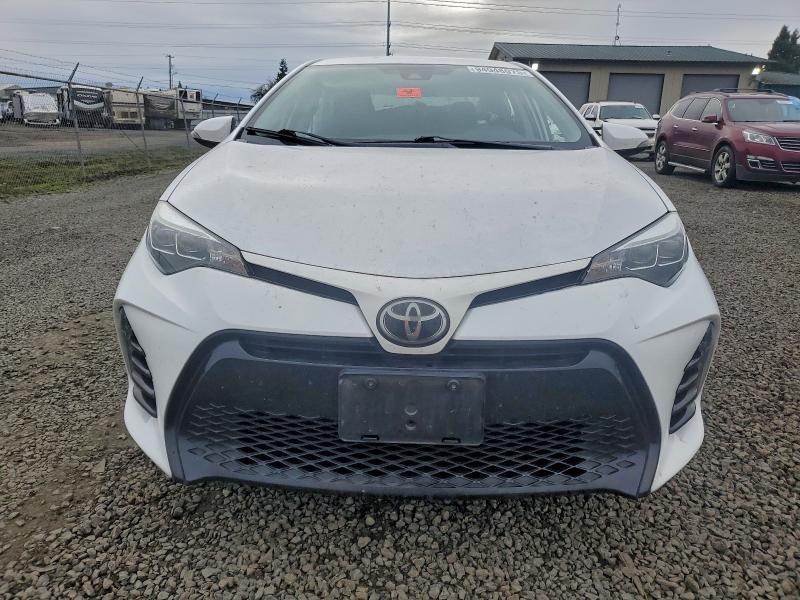 Photo 5 from auction – 2017 TOYOTA COROLLA L with VIN 5YFBURHE2HP602241