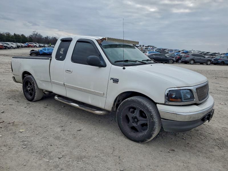 Photo 4 from auction – 2002 FORD F150 with VIN 1FTRX17WX2NB90804