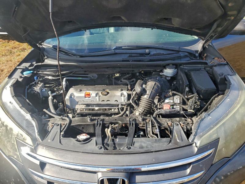 Photo 12 from auction – 2014 HONDA CR-V with VIN 5J6RM3H72EL017719